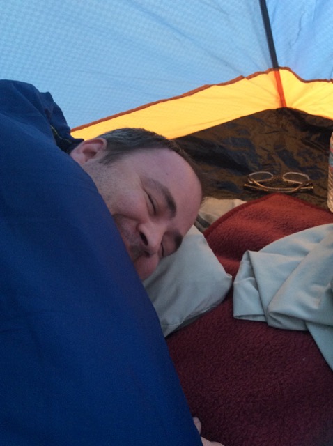 A photo of Dad in his sleeping bag